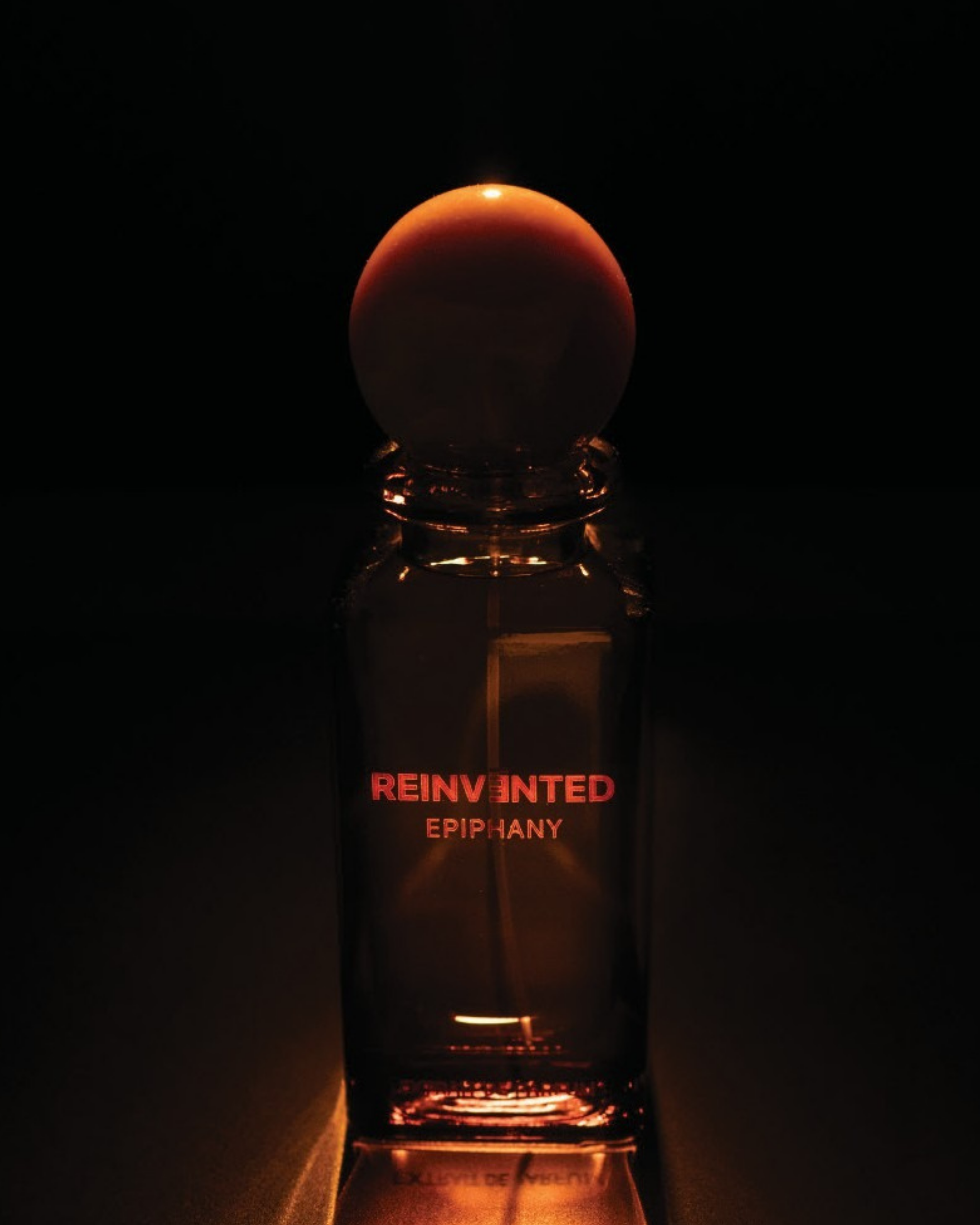 Image of Bottle labeled 'Reinvinted Epiphany' with a dark background
